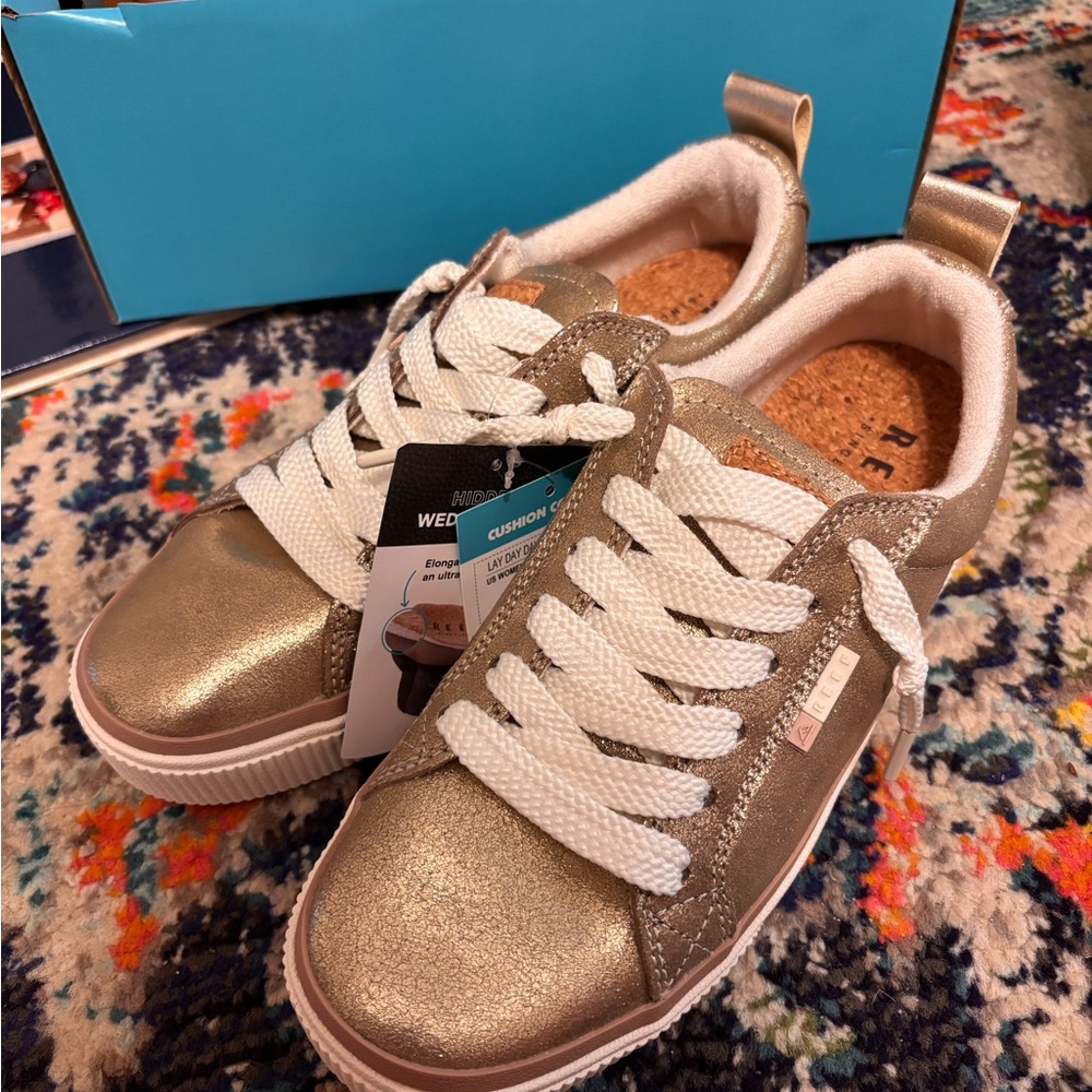 Shimmery gold Reef sneakers